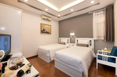 Deluxe Twin sin ventana — Adora Hotel