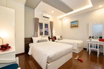 Habitación Executive Triple — Adora Hotel